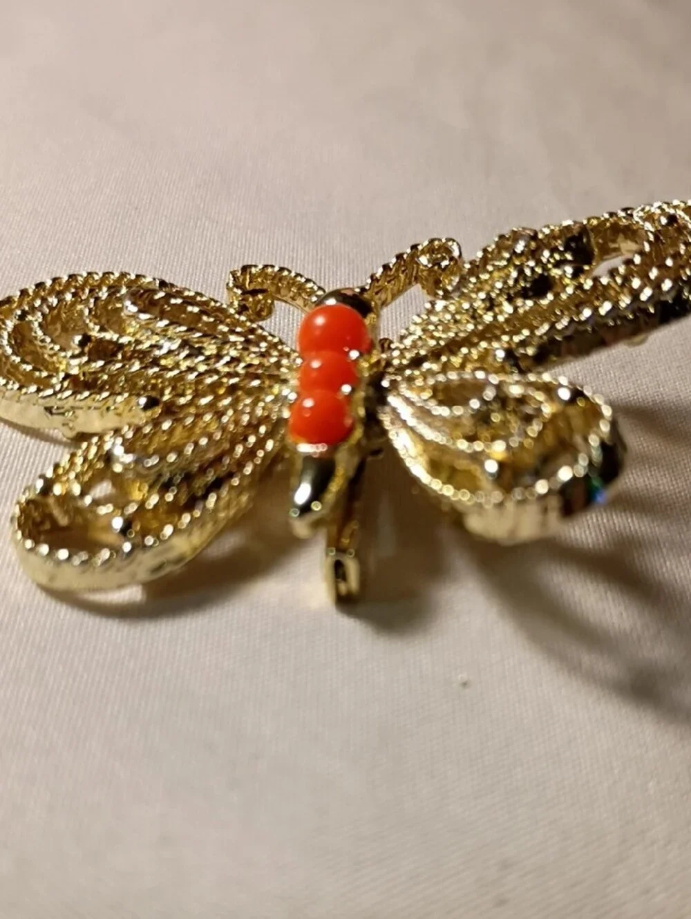 Gold-Tone Butterfly Brooch with Bright Orange Cabochons